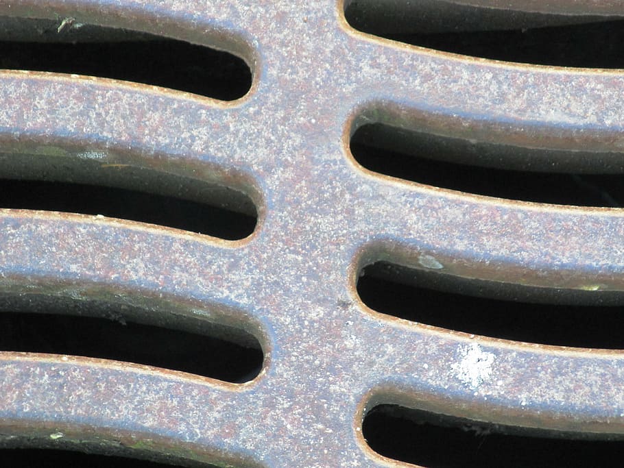 Iron sewer cover on the road
