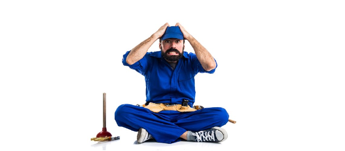 Frustrated plumber beside a plunger
