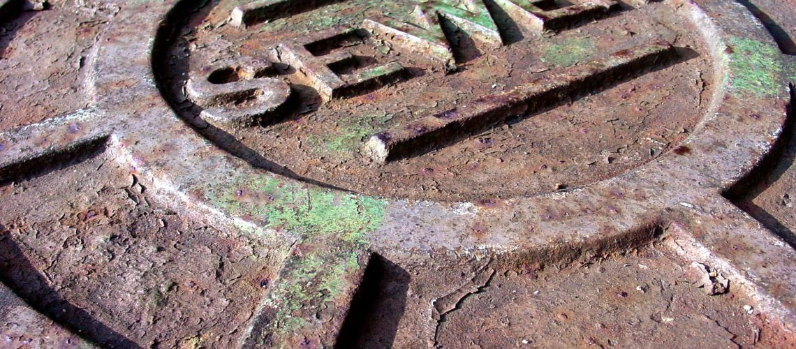 Rusted sewer manhole cover