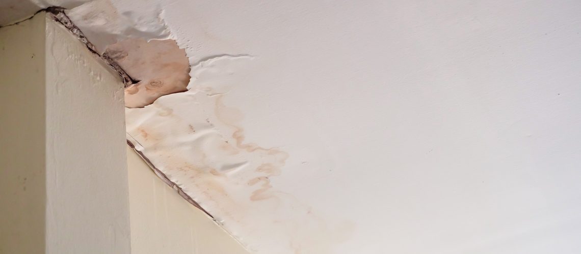 Water damaged ceiling caused by dampness